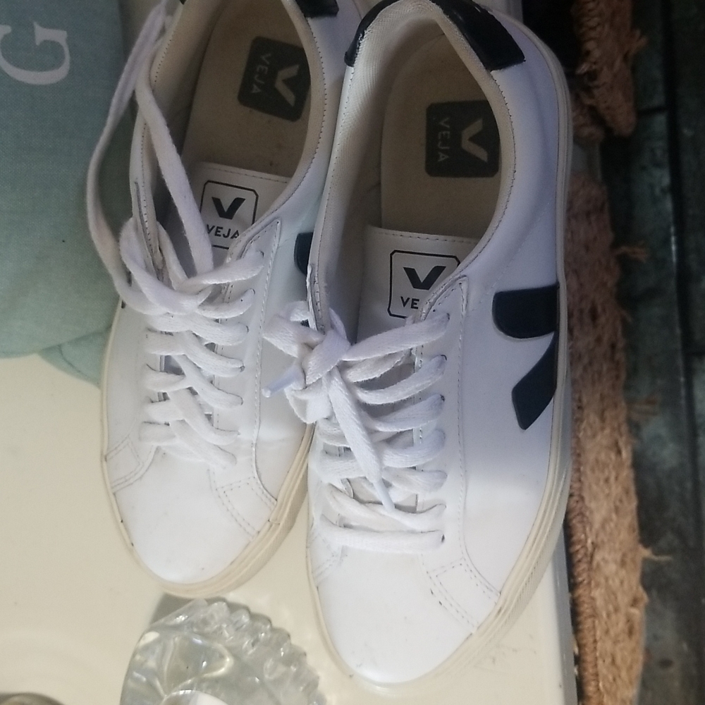 Veja white with black logo.
